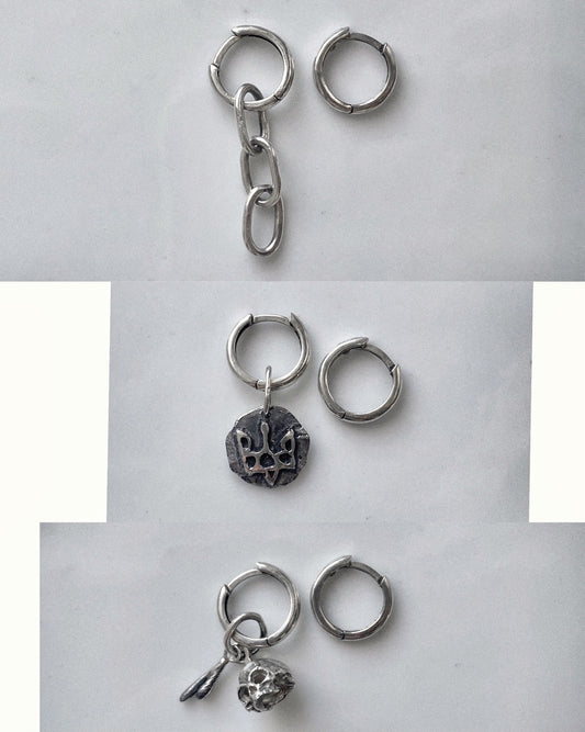 hoop earrings with a skull charm 💀