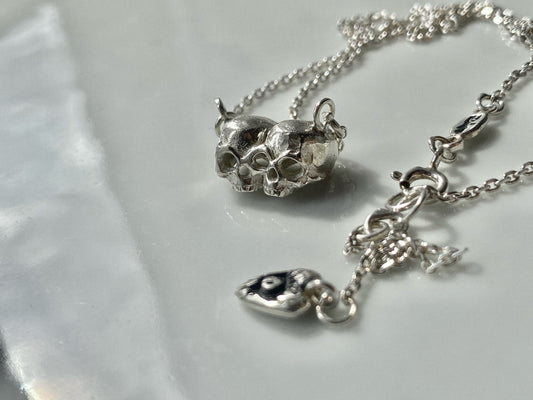 baby death twins necklace
