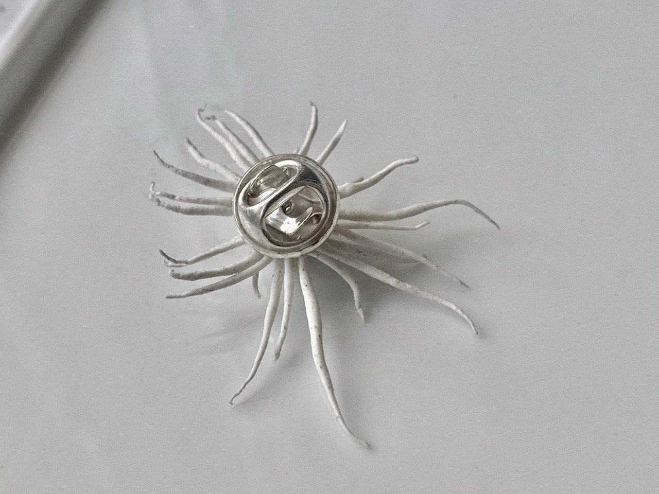 memento mori sun brooch