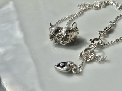 baby death twins necklace