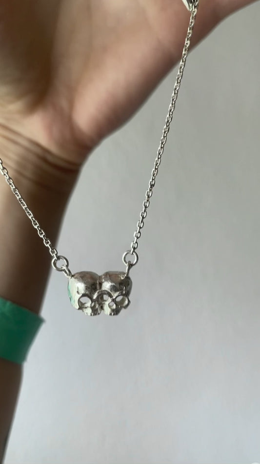 baby death twins necklace